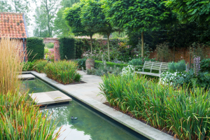 Manor garden with large water feature